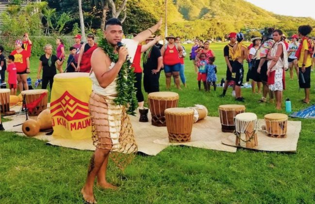 Photo: Lanakila Mangauil speaks to a gathering of Mauna Kea protectors
