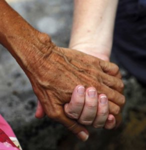 Photo: Two People Holding Hands