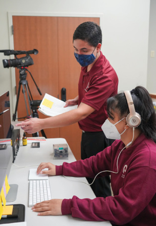 Photo: Kaniʻāina student staff members review a transcription