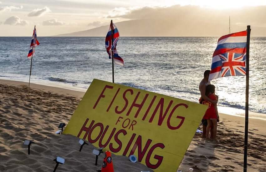 Photo: Fishing for Housing Sign with Inverted Hawaiian Flag