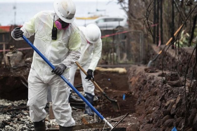 Photo: Workers removing debris from Lahaina
