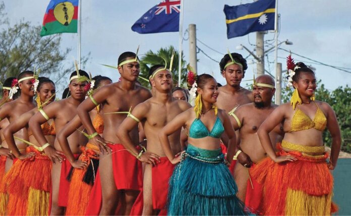 Photo: Palauan performers stand ready at the 12th FestPAC in Guam in 2016