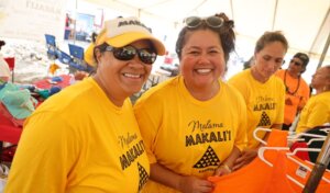 Photo: Mālama Makaliʻi Check-in and Merch Station