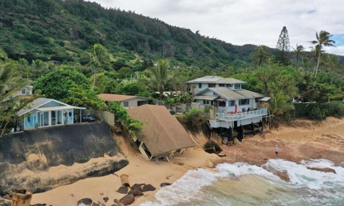 Photo: Collapsed home on the beach