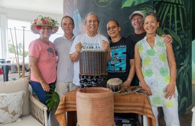 Photo: Master artisan Kanaʻe Keawe (holding the pahu) with Tahitian friends