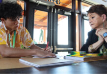 OHA Hosts Aloha ʻĀina Advocacy Workshop for Youth Photo: OHA Chair Emerita Hulu Lindsey meets with a student