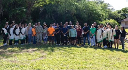 Photo: Volunteers build a rock wall at Pearl Harbor