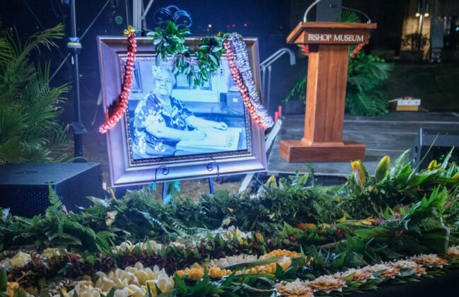 Photo: Portrait of Mary Kawena Pukui adorned with lei