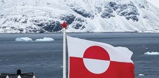 Threats to Greenland Recall the Annexation of Hawaiʻi Photo: Greenland flag flies over a home