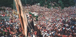 Hōkūleʻa: Reconnecting Oceania Photo: Thousands crowd around Hōkūleʻa as she arrives at Papeʻete Harbor