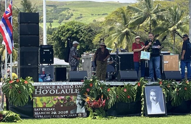 Photo: Musicians perform at the Prince Kūhiō Festival at Nā&lsquo;ālehu County Park